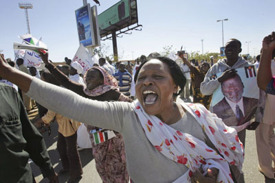 20 opposition parties demonstrated outside the Sudanese parliament on Monday, demanding electoral reforms. (AP)
