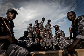 SPLA soldiers ride in the back of a pick-up in Abyei (Enough-Tim Freccia)