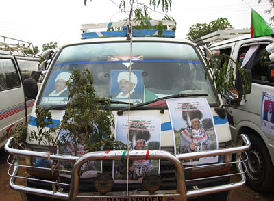 A matatu decorated with elections posters for Sudanese President Omar al-Bashir. (Enough/Maggie Fick)