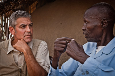 Actor George Clooney conducts an interview in southern Sudan (Credit: Tim Freccia)