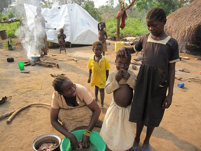 Family displaced by LRA attacks, living in an IDP camp in southern Sudan