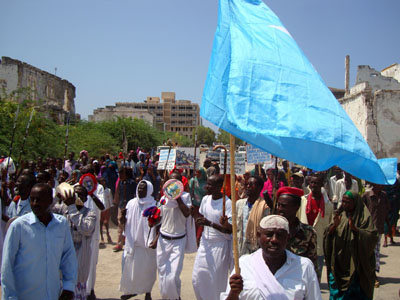 Protesters march in Mogadishu's Daljirka Dahsoon square. (AP)