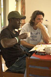 Don Cheadle and John Prendergast having coffee