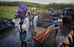 Displaced people arrive in Bor, South Sudan. (Ben Curtis/AP) Displaced people arrive in Bor, South Sudan. (Ben Curtis/AP)