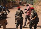 Government forces beat demonstrator - AP