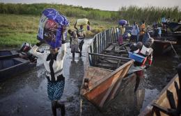 Displaced persons arrive in Bor, South Sudan (AP) Displaced persons arrive in Bor, South Sudan (AP)