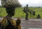 Congo woman and soldiers (AP)