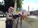 Pro-government fighter in Mogadishu - AP
