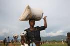 Woman with food rations - IRIN